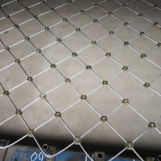 Сетка нержавеющая тросовая со скобочным креплением и ромбической ячейкой Н2 7х7 AISI 316 50х87х2 мм